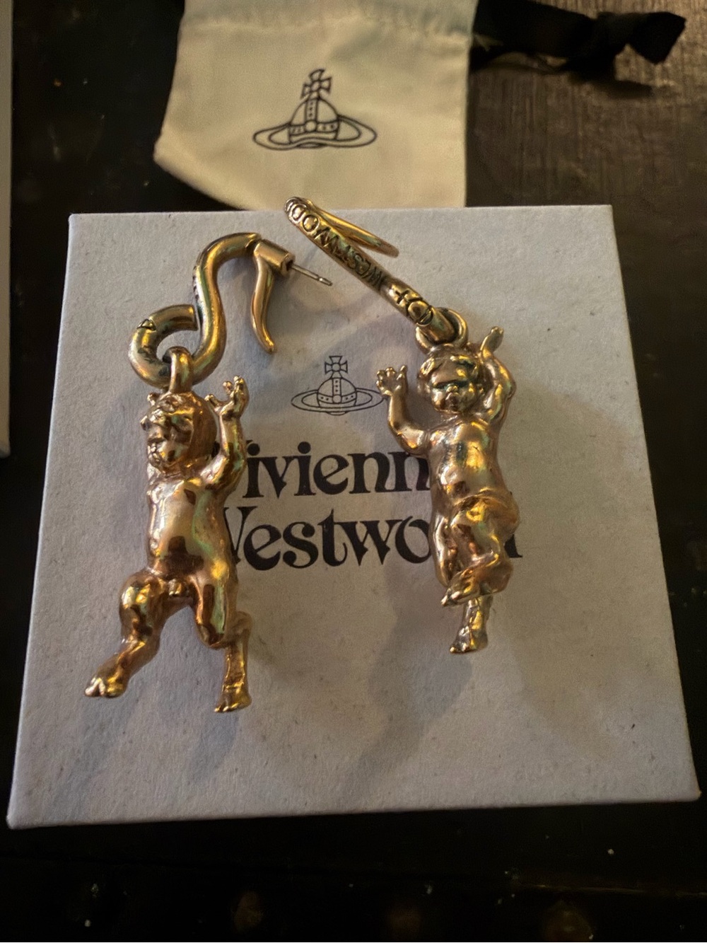 Gold tone SATYR earrings- all original packaging and docs included